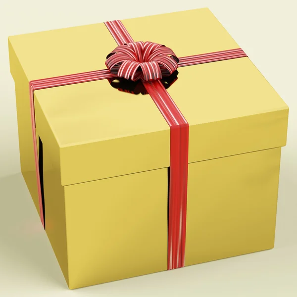 Zlato dárkové krabice s mašlí jako dárek k narozeninám — Stock fotografie