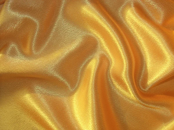 Draped golden satin background — Stock Photo, Image