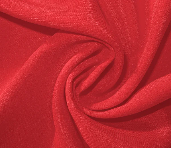 Kierretty tylsä punainen kangas — kuvapankkivalokuva
