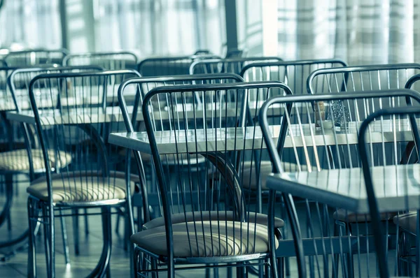 Photo of a canteen with metal chairs and tables — Stock Photo, Image