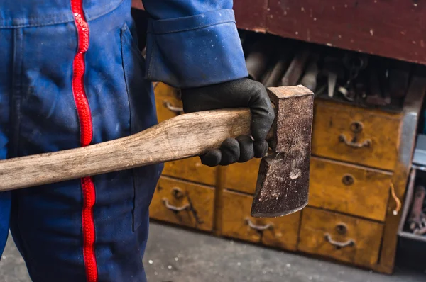 Man holding industrial axe — Stock Photo, Image