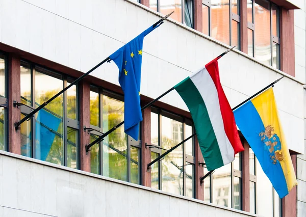 stock image Flags of some countries on an office building