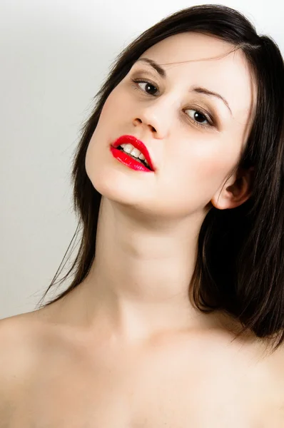 Oung fashion model with white skin and red lipstick — Stock Photo, Image