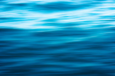 Beautiful blue water surface as a background texture clipart