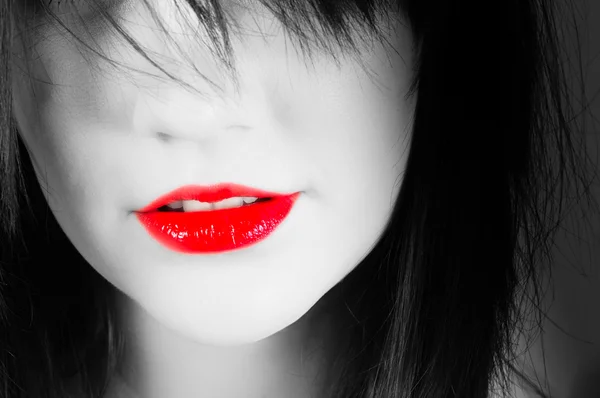 Lábios vermelhos de uma mulher — Fotografia de Stock