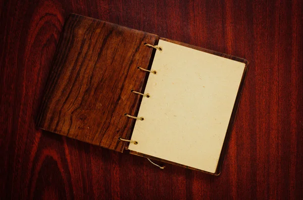 Libro in legno su sfondo scuro — Foto Stock