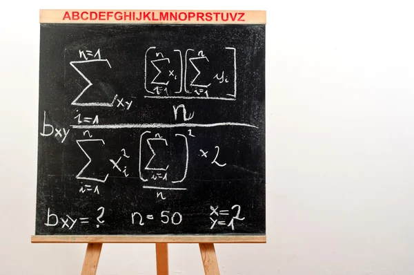 Black chalkboard with formula — Stock Photo, Image