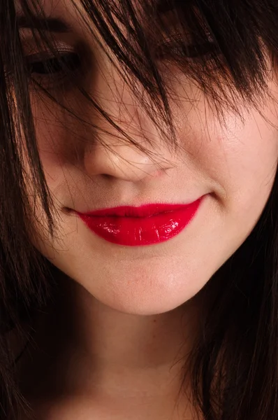 Close-up foto van een vrouw met rode lippen — Stockfoto