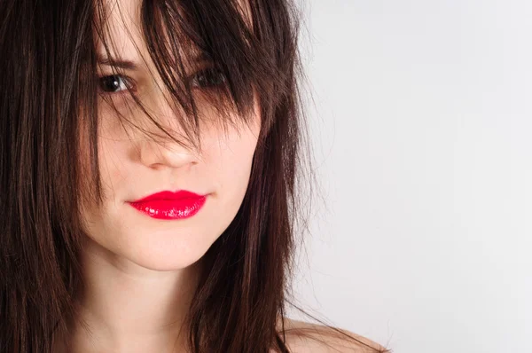 Foto de close-up de uma mulher com lábios vermelhos — Fotografia de Stock