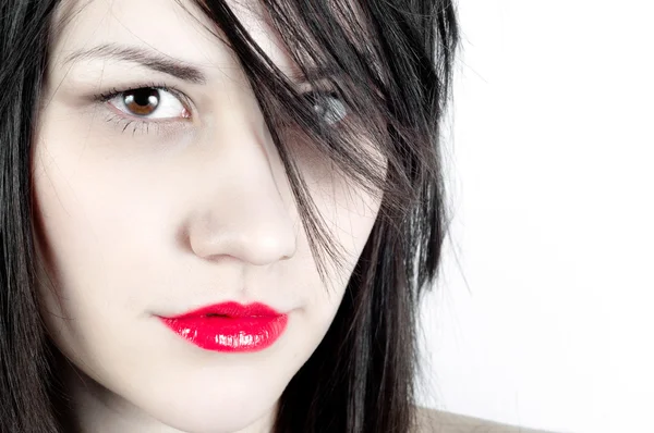 Foto de close-up de uma mulher com lábios vermelhos — Fotografia de Stock