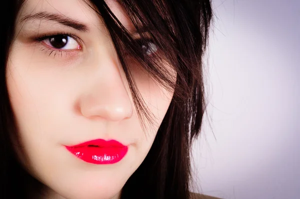 Closeup φωτογραφία μιας γυναίκας με κόκκινα χείλη — Φωτογραφία Αρχείου