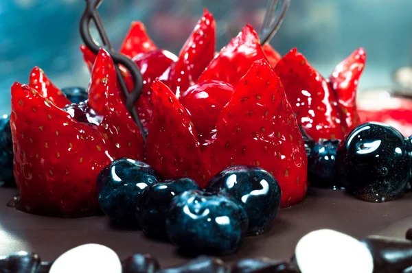 Delicious fruits on cake — Stock Photo, Image