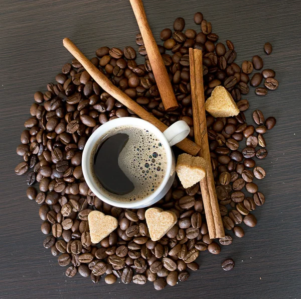 stock image Coffee beans in a cup on dark background