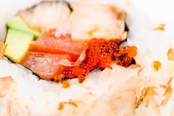 Red caviar macro on sushi — Stock Photo, Image