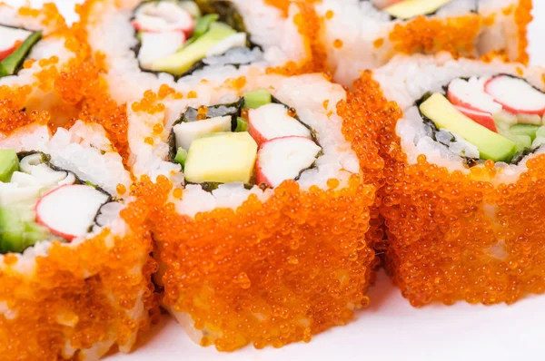 Sushi z mięsa kraba, awokado i czerwonym kawiorem — Zdjęcie stockowe