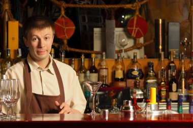 Barman at work - indoors clipart