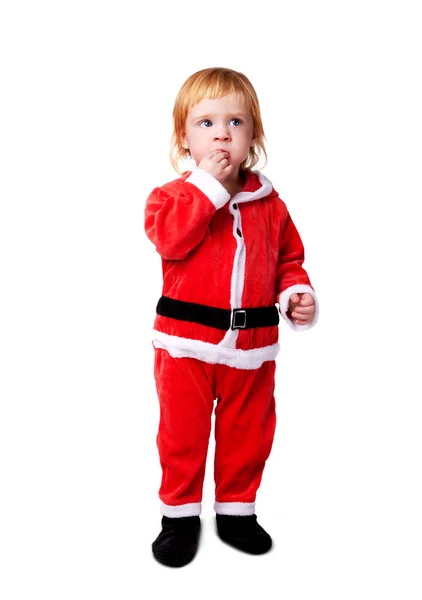 Porträt des kleinen süßen Babys in der roten Suite von Weihnachtsmann isoliert — Stockfoto