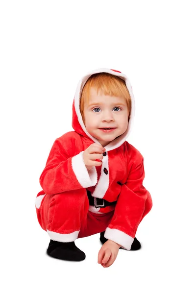 Portret słodkie maleństwo w Apartament czerwony na białym tle Santa — Zdjęcie stockowe