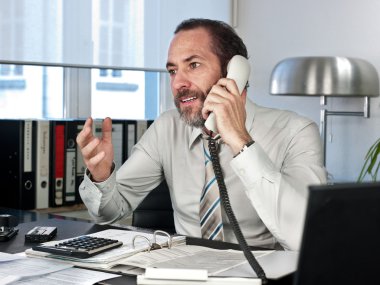 Businessman on the phone clipart
