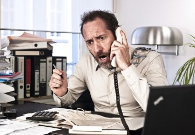 Furious Businessman on the phone clipart