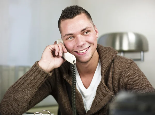 Businessman having conversation on telephone — Stock Photo, Image