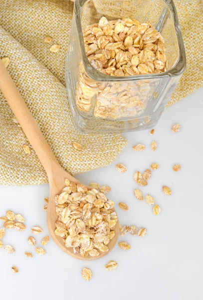 stock image Oat-flakes with a wooden spoon