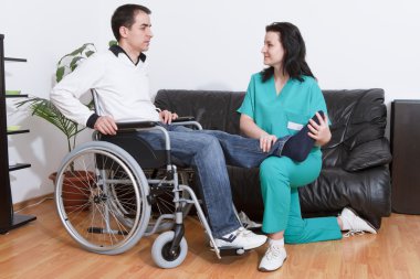 Physical therapist working with patient clipart