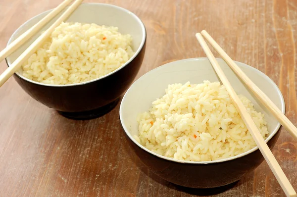 Several bowls of healthy organic rice — Stock Photo, Image