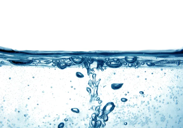 Синя вода з бульбашками — стокове фото