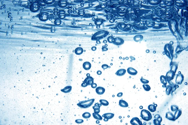 Blue water with bubbles — Stock Photo, Image