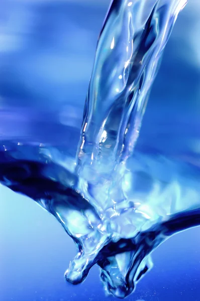 Centelhas de água azul — Fotografia de Stock