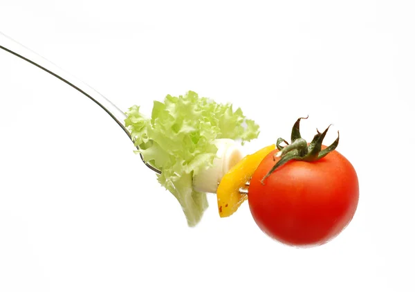 Körsbär tomat på gaffeln — Stockfoto
