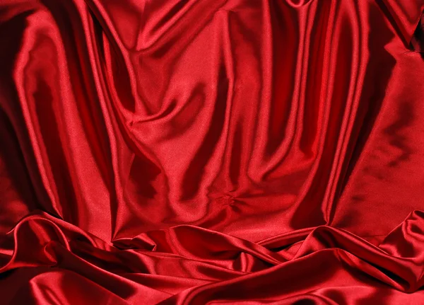 Элегантный красный атласный фон — стоковое фото