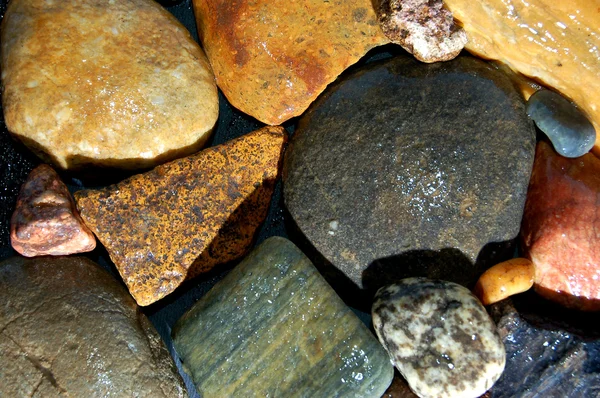 Abstrakter Hintergrund mit bunten Steinen — Stockfoto