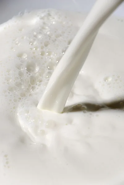 stock image Pouring milk