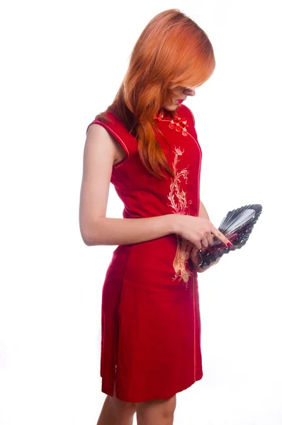 Chinees meisje in een rode jurk — Stockfoto