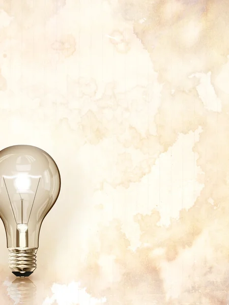 Lightbulb on grunge background — Stock Photo, Image