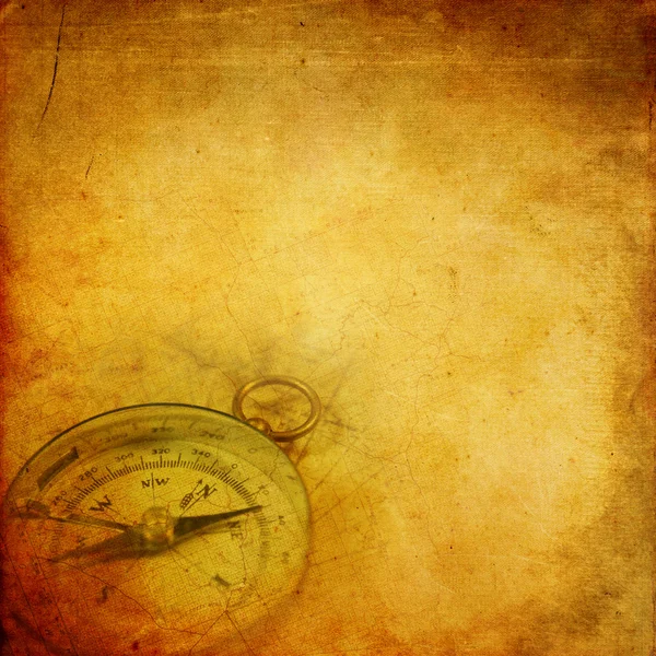 Altpapier mit Kompass — Stockfoto