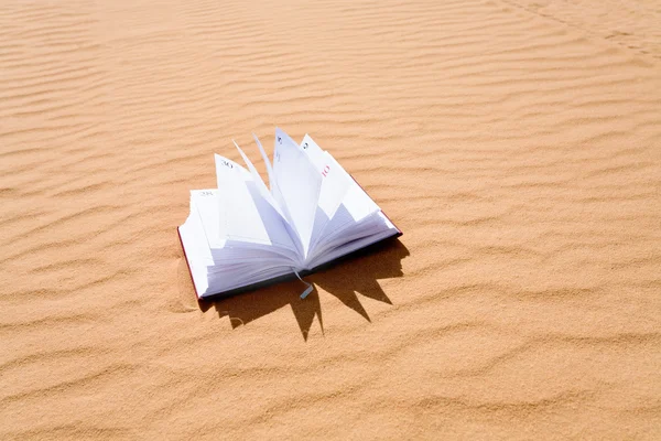 Notebook in sand dune dessert — Stock Photo, Image