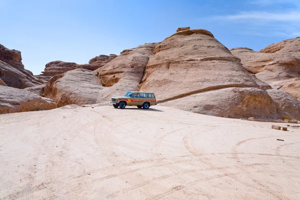 stock image Car in Wadi Rum dessert