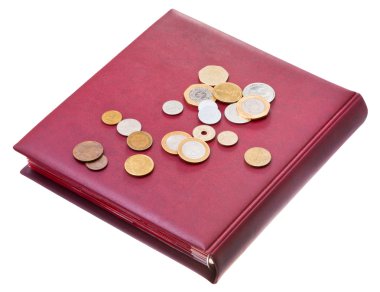 Different coins on red numismatics album clipart