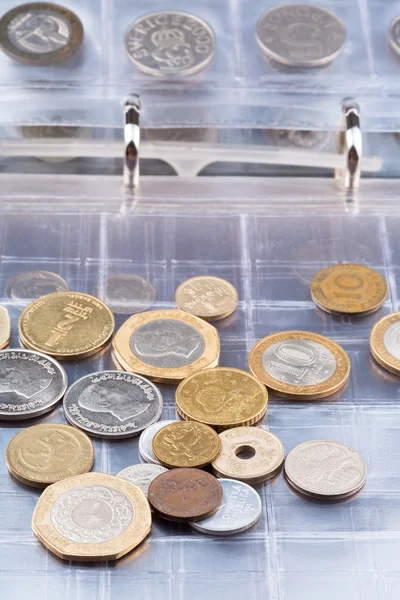 Numismatics album with different coins — Stock Photo, Image