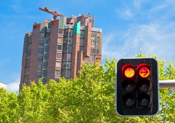 Building construction and red light — Stockfoto