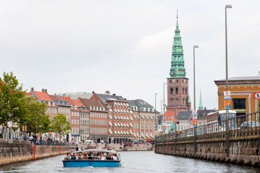 Boat guided tour on Frederiksholms Kanal, in Copenhagen clipart