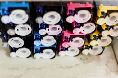 Disassembled color cartridges clipart