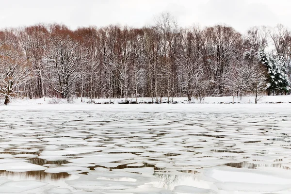 Floating of ice on river at early spring evening — Stock Photo, Image