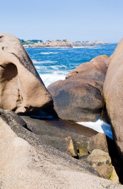 Rocks on Pink Granite Coast in France clipart