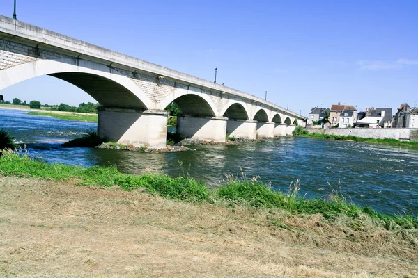 stock image Highway bridge through wide river