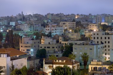 Living district Amman city at night clipart