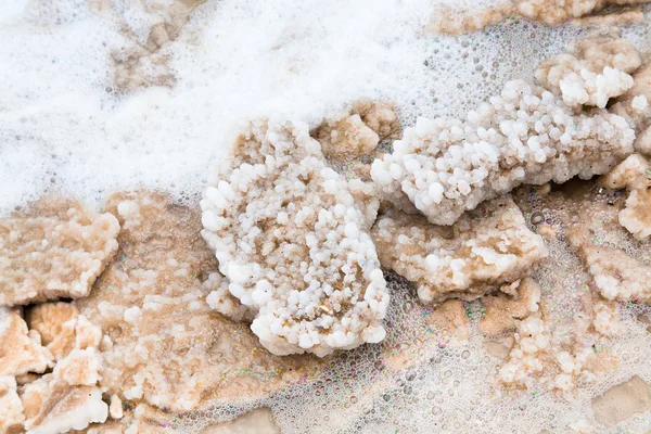 stock image Crystalline salt on beach of Dead Sea